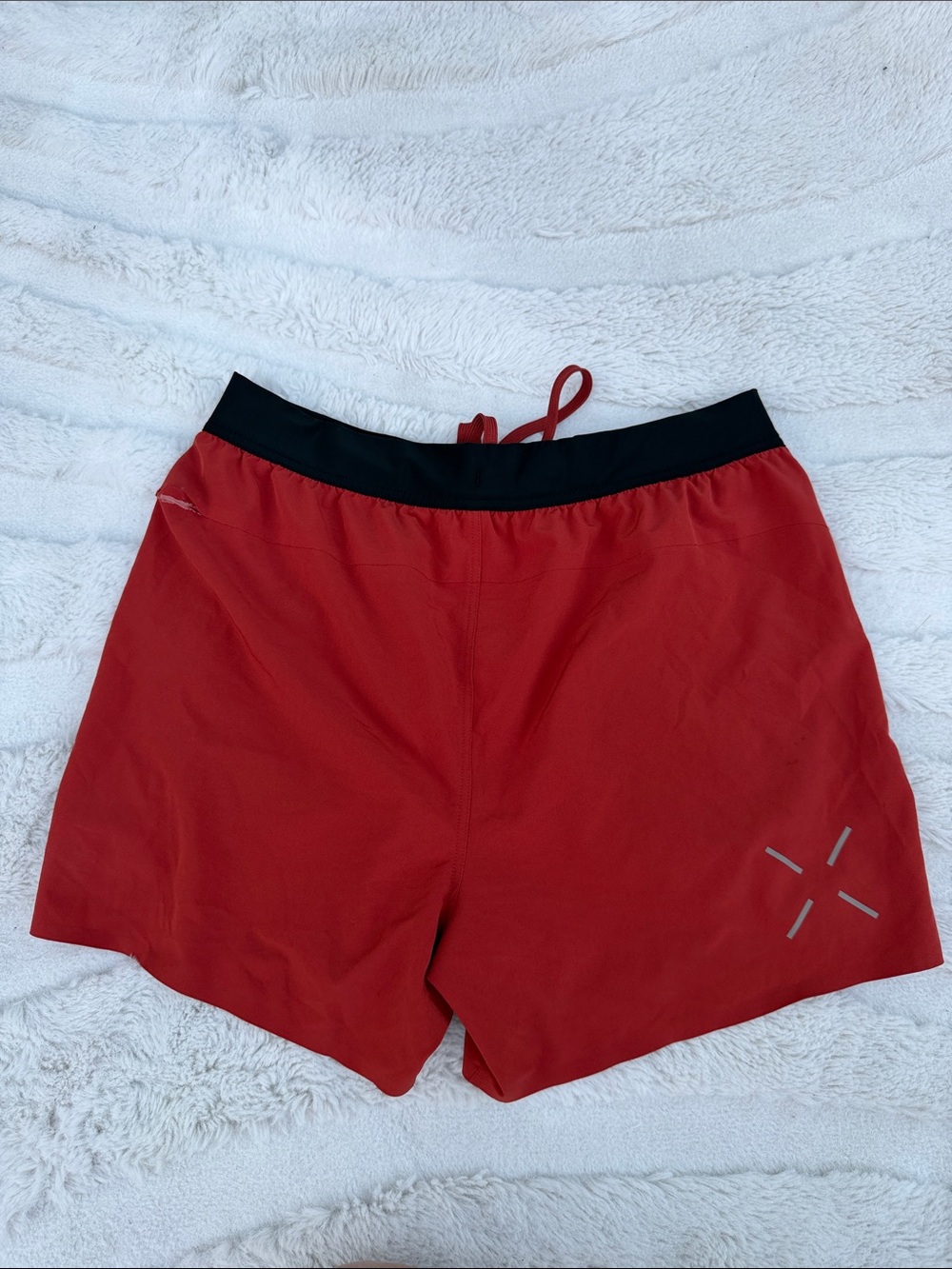 Ten Thousand the interval short, 5 inch inseam in Mesa red unlined
